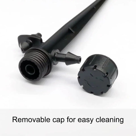 Close-up of drip emitter stake with removable cap from 25 Adjustable Drip Irrigation Emitters With Stakes 0 To 18 GPH Flow 360 Degree Sprinkler Heads For Garden Lawn Flower Beds Patio Micro Irrigation System Easy DIY Budget Friendly Watering Solution.