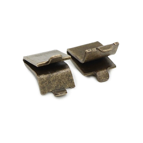 Built Tough Adjustable Steel Pilaster Shelf Clip Brackets With Dead Simple Slide Mount And Smooth Galvanized Coating For Any Standard Wood Or Metal Shelving Rack System Bronze Pack Of Fourteen close-up of two steel brackets