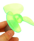 Small green propeller component of Portable Mini Wind Generator For Emergency Power And Phone Charging With 60Hz Output 6V Voltage And 4 Stroke Engine On The Go Outdoor Power Source For Camping Hiking Or Off Grid Anywhere