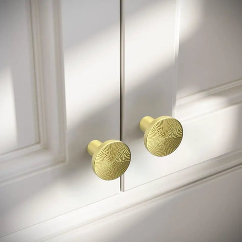 Six Pack Engraved Boss Grade Brushed Brass Kitchen Cabinet Knobs One Inch Round Solid Dresser Drawer Pulls on white cabinet