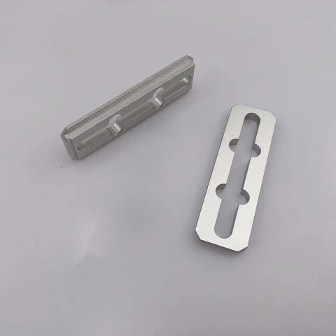 Two silver components from 4 Pack CNC Machined Anodized Aluminum Top Clamps For CNC Machine Replacement Hardware, top view