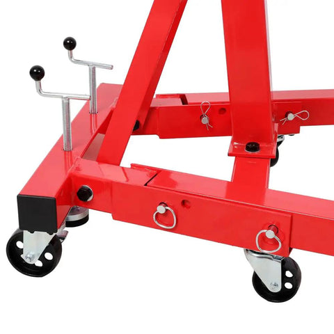 Close-up of Heavy Duty Folding Engine Stand With Geared 360 Degree Rotating Head And Adjustable Mounting Arms wheels and supports.