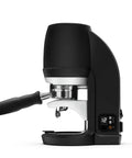 Automatic Espresso Tamper Tool For 58 Mm Commercial Portafilters And Pro Barista Gear Smooth Operator Puck Press For La Marzocco VST And Synesso Systems, black, side view, compact design.