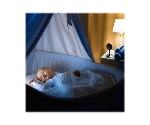 1080P Indoor Camera With Night Vision And 2 Way Audio Rolling 2 Day History Free For Two Years Motion Alerts For Pet Or Baby Monitoring Easy Setup And Works With Alexa And Google Home beside a sleeping baby in crib