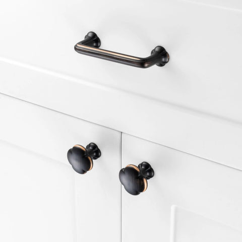 10 Pack 3 Inch Hole Centers Oil Rubbed Bronze Cabinet Pulls With Clover Design on white cabinet