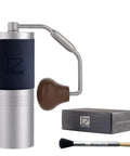 Barista-Grade Manual Coffee Grinder with 48mm stainless steel conical burr, adjustable settings, handle and box visible
