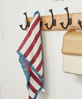 Heavy Duty Wall Mount Coat Rack With Seven Rugged Zinc Hooks For A Slick Entryway, displaying a striped scarf and handbag.