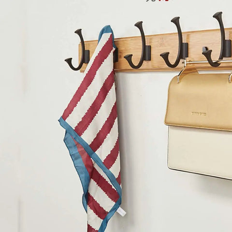 Heavy Duty Wall Mount Coat Rack With Seven Rugged Zinc Hooks For A Slick Entryway, displaying a striped scarf and handbag.