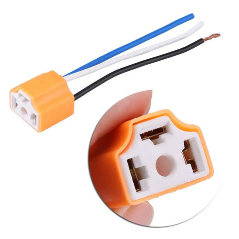 High Octane H4 9003 And HB2 Headlight Connectors Paired With Pre Wired Ceramic Sockets Two Pack close-up view of orange socket.