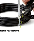 trueCABLE Precision Flush Cutter with black non-slip handle cutting a white zip tie around a coiled USB-C cable.