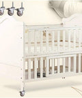 Four Pack Silent Rubber Caster Wheels Deliver A Legit Ultra Smooth Glide With Double Ball Bearing Swivel Action And Heavy Duty Carbon Steel Brackets on a crib.