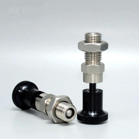 Top Shelf Stainless Steel Plunger Pin Set Double Pack For Tool Chest Organization With Quick Release Pull Ring Spring Loaded Self Locking Knob M10 Threads angled view of two stainless steel plunger pins with black knobs.