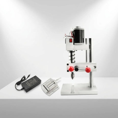 Compact Red Mini Bench Drill Press With Lever Operated Quill And Precision Adjustment Knobs, sturdy metal construction.