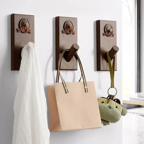 Slick Wall Mounted Coat Rack With Nifty Key Organizer Hook For Bathroom Entryway Closet Top Tier Heavy Duty Multi Hook Stand No Hassle Setup For Versatile Hats Purses And Keys with three hooks holding bags and a scarf.