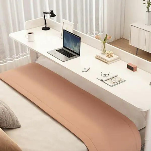 Smooth Rolling Height Adjustable Laptop Desk On Wheels For Home Office And Bedside Setup, large white surface with laptop and decor.