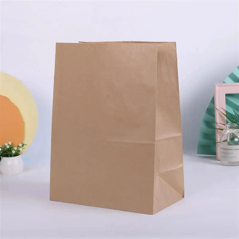 Kraft Paper Bags Khaki Party Favor Bags Set Of 50 Or 100 Pcs In 28x28x14 Cm Eco Friendly Gift Bags on display table