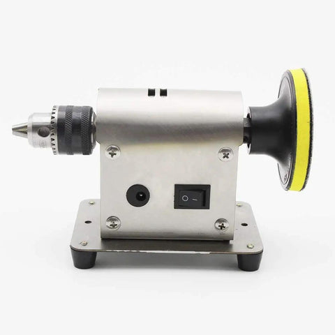 Side view of Jewelry Polishing Machine Multifunction Bench Buffer Grinder This All In One Workhorse Tool Delivers Smooth Clean Finishes With 4500 To 9000 RPM Variable Speed For Delicate Jewelry Polishing And Metal Finishing At Home Or Studio, featuring silver body and large buffing wheel.