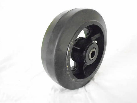 Pro Grade Swivel Caster With Kingpinless Build And Trusty Top Lock Brake Housing A Bombproof Six Inch Rubber Wheel On A Steel Hub Handling Five Fifty Pounds Built Damn Tough For Tool Boxes And Mobile Carts - Close-up of rubber wheel.