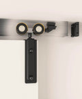 Close-up of installed 60 Inch Box Rail Sliding Barn Door Hardware Kit with Ceiling Mount Heavy Duty Aluminum Track in Black Powder Coat
