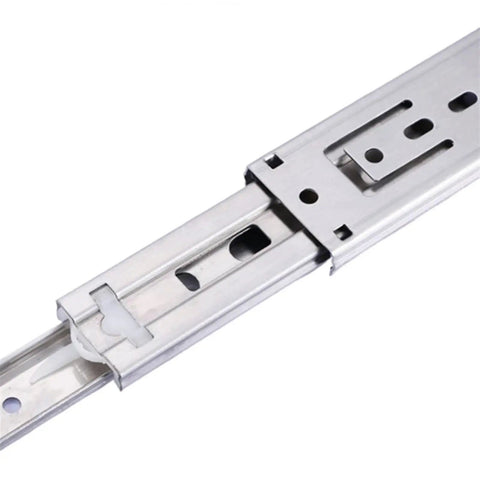 Close-up of full extension drawer slides 10 to 22 inches stainless steel three section drawer slide system for cabinets and furniture hardware.
