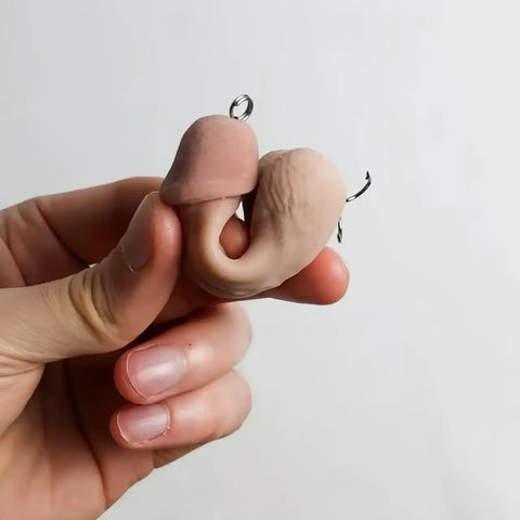 Person holding Penis Prank Fishing Hook Realistic Novelty Lure For Fishing Hilarious Gag Gift For Anglers