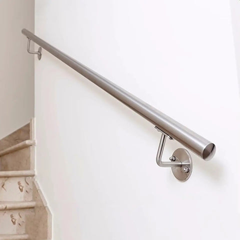 Heavy Duty Stainless Steel Handrail Kit For Indoor And Outdoor Decks Stairs And Balconies With No Sweat Wall Mount Setup and Pro Grade Two Inch Tubing Safety Guard Rail System on a stairway.