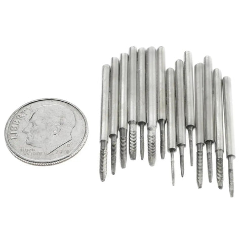 Metric Tap And Die Set High Carbon Steel With Storage Case pieces beside a dime for size comparison