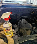 Bottle of 3 In 1 Penetrating Lubricant Oil Plant Based Biobased Food Grade Degreaser And Rust And Corrosion Remover in vehicle engine bay