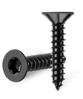 Top Shelf One Hundred Pack Six By Three Quarter Inch Flat Head Torx Star Drive Wood Screws Premium 18 8 Stainless Steel Black Coated showing two screws.