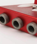 Close-up of red Pocket Hole Drill Guide Aluminum Alloy Woodworking Jig For Precise Hidden Joints And Fast Furniture Assembly