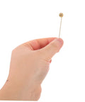 Hand holding a copper flat round blank base brooch pin from Awesome 50 Sets Copper Flat Round Blank Base Brooch Pins.