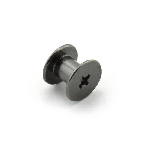 Close-up of a heavy-duty black steel Chicago screw from the Straight Up 120 Piece Chicago Screw Set With Phillips Drive Binding Rivets.