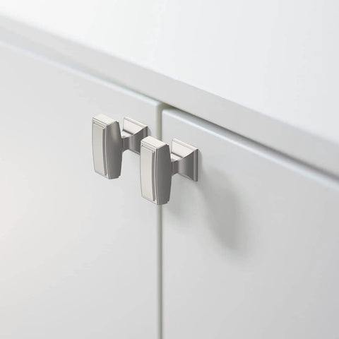 Rectangular silver cabinet handles on white doors, visibly distinct from Oil Rubbed Bronze Cabinet Knobs, 20 Pack, 1.4 Inch 35mm Zinc Alloy Drawer Pulls.