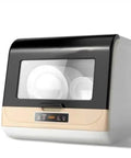 Gold Portable Countertop Dishwasher Features Smart Auto Wash Plus Bacteria Killing Disinfection And Sterilization Power with clean plates inside.