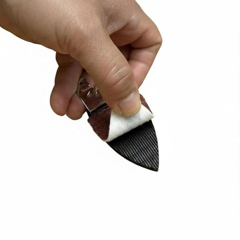 Hand holding 52 Piece Finger Oscillating Multi Tool Sanding Pads Kit With Two Finger Pads And Fifty Sandpaper Sheets Aluminum Oxide