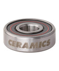 Bronson ceramic skateboard bearing, metal outer shell with red seal, close-up view