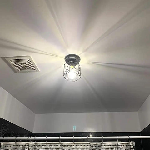 Retro Black Industrial Cage Ceiling Light 2 Pack, Compact Semi Flush Mount Pendant Fixture With E27 Base For Hallways Stairways Bedrooms And Kitchens solid build illuminating a bathroom.