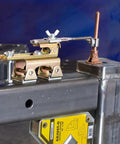 Strong Hand Tools Deluxe Magnetic Grasshopper welding finger with copper spindle and magnetic V-pad base on workbench