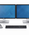 High Performance Thunderbolt Dock TB16 180W USB C Multiport Hub With Eu Power Cord setup with dual monitors, laptop, and accessories.