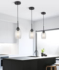 Black Seeded Glass Mini Pendant Light Adjustable Pendant Fixtures With Handblown Seeded Glass Shade over Kitchen Island