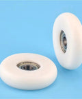 Cool 20 Pack Circular Arc Plastic Coated Bearings 608ZZ 608 Guide Wheel Pom Units For Smooth Sliding Motion And Rust Proof Durability With Self Lube Design To Cut Maintenance Hassles Fast - two white POM guide wheels.
