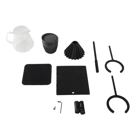 Premium 6 Piece Manual Brewing Station Featuring Rock Solid Aluminum Alloy Stand Clear Heat Resistant Glass Mugs And Precision Ceramic Pour Over Filter For Your Everyday Coffee Routine includes glass pitcher, black cup, filter cone, and accessories.