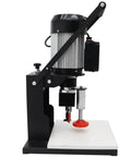 Front view of WYDDDARY hinge drilling and boring machine; portable woodworking drill press with black frame and silver motor.