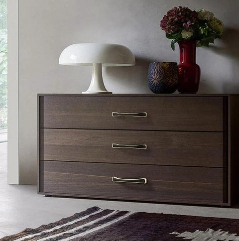 Dark wooden dresser with 2 Pack 5.0 Inch Hole Center Zinc Alloy Square Cabinet Handles In Black Gold Finish installed.