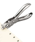 Mini Circle Hole Punch Set Dope For DIY Crafts And Tags 6mm 3mm And 1.5mm Holes handheld punch shown in use punching paper