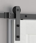 Close-up of Sliding Barn Door Roller Set Black I Shape Hanger Set Made From Carbon Steel with Black Powder Coat installed on door.