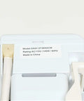 Back view of Icemaker Assembly Replacement DA97-07365G for refrigerator showing model label and white housing.
