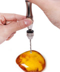 Person using Rock Solid Aluminum Hand Pin Vise Kit Hella Tough with micro twist drill on resin for detailing work.