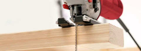 Ultra Tough Extra Long Single Lug Jigsaw Blades Designed For No Sweat Cutting Through Wood Hardwood Chipboard And Soft Plastics Pro Level Precision Results Pack Of Twenty Fits Einhell Bosch Jigsaws cutting through a wooden plank.