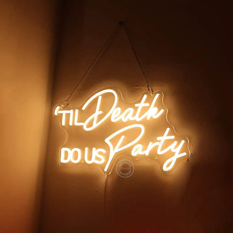 Til Death Do Us Party Neon Light Sign For Wedding Reception And Bridal Shower Backdrop Bedroom Wall Decor 17 Inch Warm White LED With USB Power And Dimmer Switch Ideal Birthday Gift And Romantic Home Decor glowing on wall.